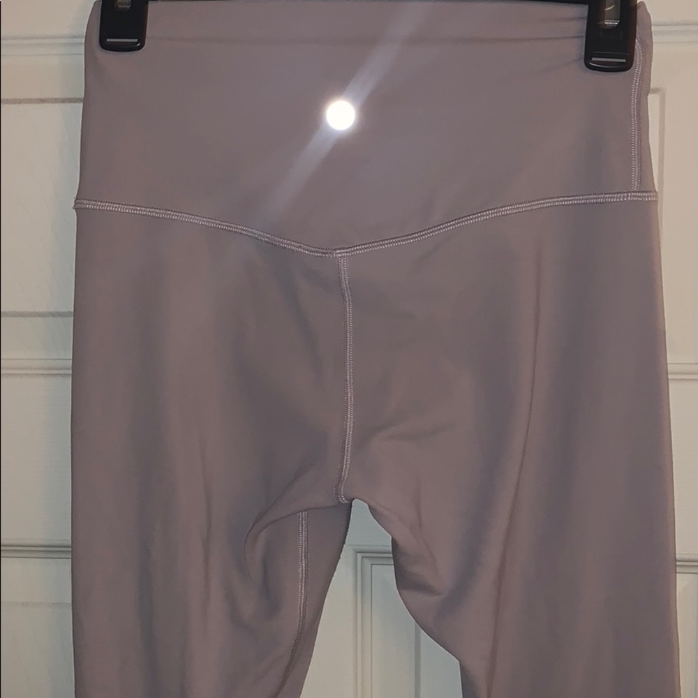 Lululemon Align Pants in a muted pink.